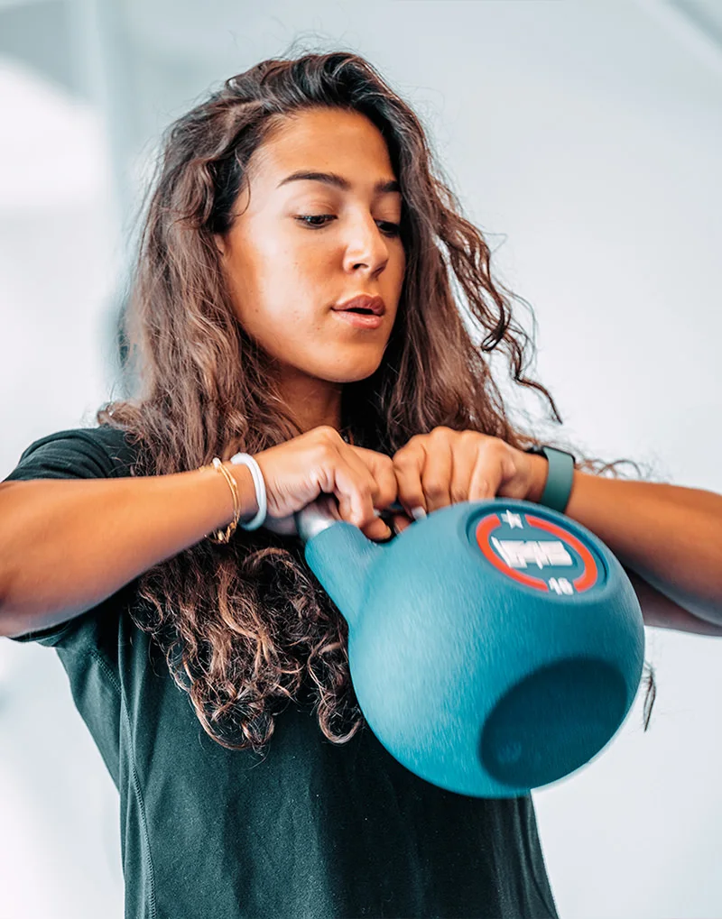 A woman training at F45